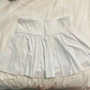 Halara ruffle tennis skirt! Has built in shorts with phone pocket!